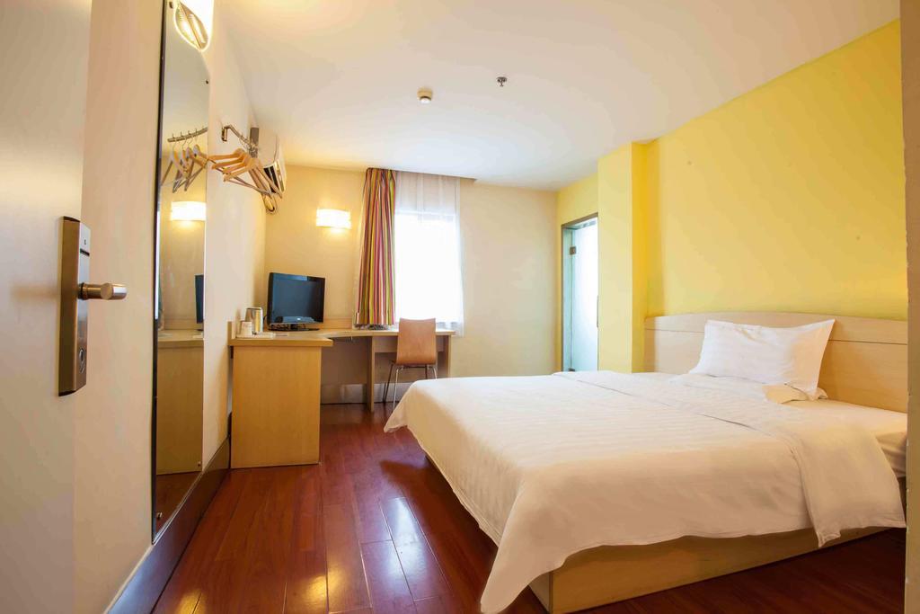 7Days Inn Guangzhou Xinshi Habitación foto