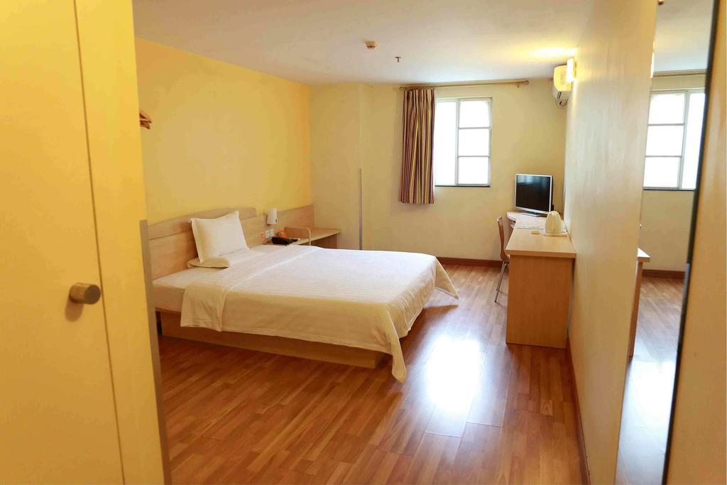 7Days Inn Guangzhou Xinshi Habitación foto