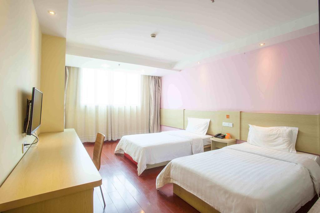 7Days Inn Guangzhou Xinshi Habitación foto