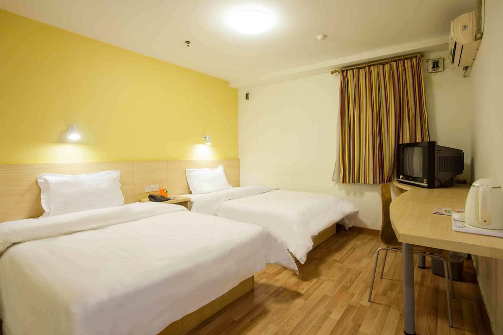 7Days Inn Guangzhou Xinshi Habitación foto