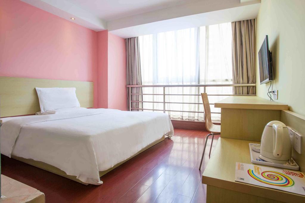 7Days Inn Guangzhou Xinshi Habitación foto