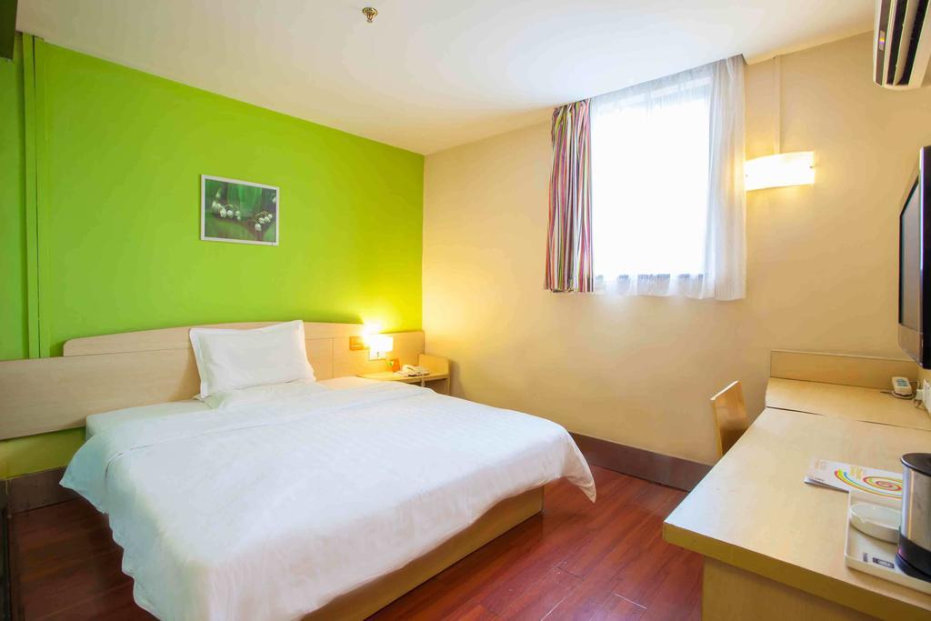 7Days Inn Guangzhou Xinshi Habitación foto
